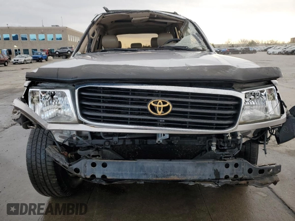 2000 Toyota Land Cruiser z VIN JT3HT05J4Y0088451, wystawiony jako Copart lot #52208905 z przebiegiem 329 751 mil mil oraz Nie do naprawy • Non repairable. Historia ofert i sprzedaży dostępna na DreamBid. Obrazek 5.