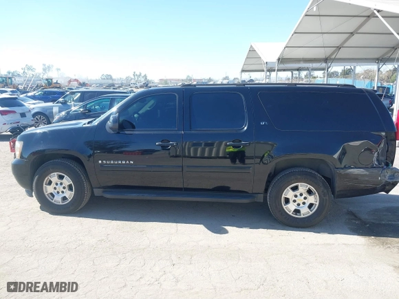 2007 Chevrolet Suburban LT with VIN 3GNFC16J07G243215, listed as a IAAI auction lot 41631673 with 200,990 mi miles. Bid and sale history available at carsss.com. Image 15.