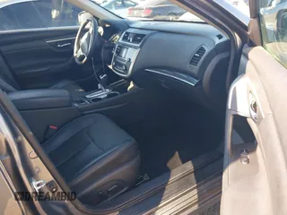 2016 Nissan Altima SV with VIN 1N4AL3AP7GC147035, listed as a IAAI auction lot 41419451 with 104,810 mi miles and . Bid and sale history available at DreamBid. Image 5.