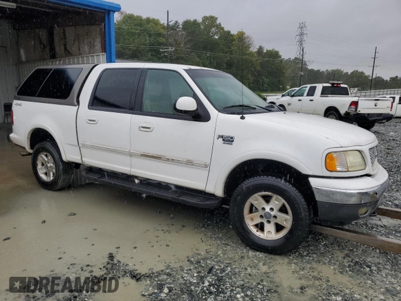 2002 Ford F-150 XLT with VIN 1FTRW08692KE20555, listed as a Copart auction lot 73571414 with 166,288 mi miles and Clean Title. Bid and sale history available at carsss.com. Image 4.