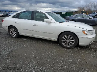 2007 Hyundai Azera SE with VIN KMHFC46F67A209716, listed as a Copart auction lot 79777864 with 152,692 mi miles and Salvage Title. Bid and sale history available at carsss.com. Image 4.