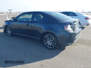 2015 Scion tC with VIN JTKJF5C71F3090963, listed as a IAAI auction lot 41802183 with 107,650 mi miles. Bid and sale history available at carsss.com. Image 3.