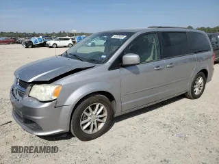 2014 Dodge Grand Caravan SXT with VIN 2C4RDGCG2ER273533, listed as a Copart auction lot 49228495 with 124,070 mi miles and Salvage Title. Bid and sale history available at DreamBid. Image 1.