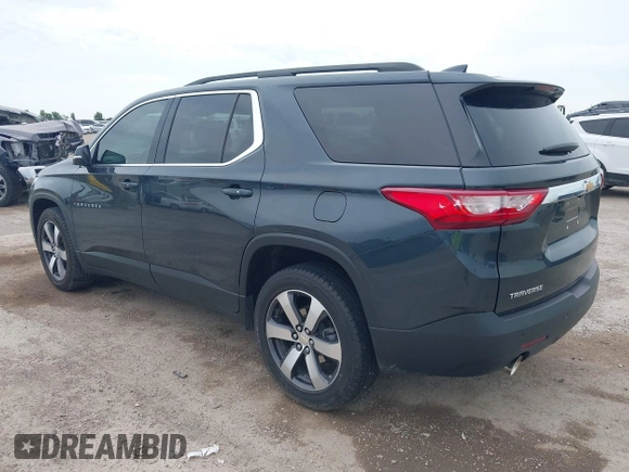 2021 Chevrolet Traverse LT with VIN 1GNERHKW4MJ191814, listed as a IAAI auction lot 42185544 with 87,493 mi miles and . Bid and sale history available at DreamBid. Image 3.