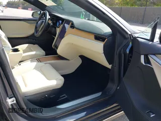 2020 Tesla Model S Long Range with VIN 5YJSA1E24LF415849, listed as a IAAI auction lot 42571945 with 34,398 mi miles and . Bid and sale history available at DreamBid. Image 5.