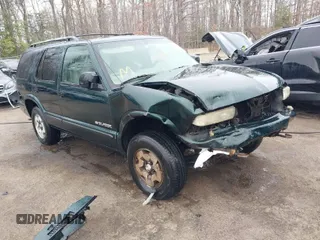 2004 Chevrolet Blazer LS z VIN 1GNDT13X74K156352, wystawiony jako IAAI lot #41770322 z przebiegiem 140 491 mil mil oraz . Historia ofert i sprzedaży dostępna na DreamBid. Obrazek 1.