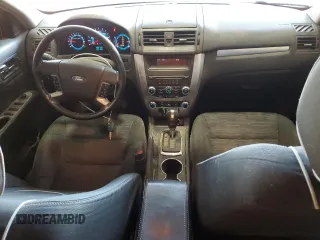 2012 Ford Fusion SE with VIN 3FAHP0HA3CR325781, listed as a Copart auction lot 52038025 with 134,349 mi miles and Salvage Title. Bid and sale history available at DreamBid. Image 8.