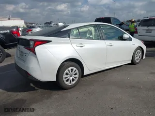 2021 Toyota Prius L Eco with VIN JTDKAMFUXM3144845, listed as a IAAI auction lot 41358306 with 1 mi miles. Bid and sale history available at carsss.com. Image 4.