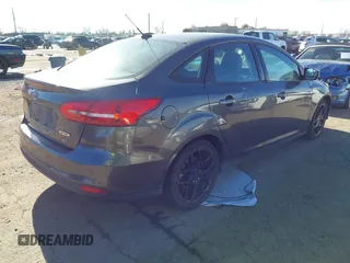 2016 Ford Focus SE z VIN 1FADP3F27GL321507, wystawiony jako IAAI lot #41278203 z przebiegiem 157 910 mil mil oraz . Historia ofert i sprzedaży dostępna na DreamBid. Obrazek 4.
