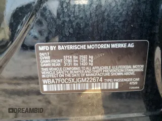 2018 BMW 7 Series 750i with VIN WBA7F0C5XJGM22674, listed as a Copart auction lot 74833524 with 0 mi miles and Salvage Title. Bid and sale history available at carsss.com. Image 12.