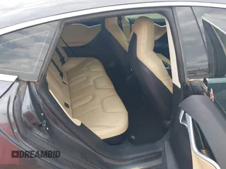 2016 Tesla Model S 90D with VIN 5YJSA1E27GF129130, listed as a IAAI auction lot 41922227 with 134,422 mi miles and . Bid and sale history available at DreamBid. Image 8.