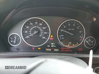 2015 BMW 3 Series 328i z VIN WBA3A5G53FNS90977, wystawiony jako Copart lot #60693435 z przebiegiem 154 136 mil mil oraz Szkoda całkowita • Salvage title. Historia ofert i sprzedaży dostępna na DreamBid. Obrazek 9.