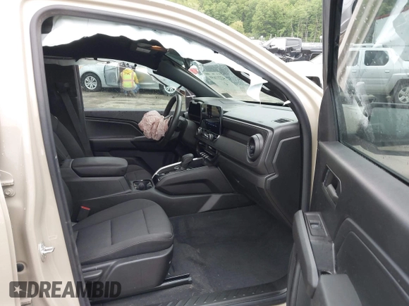 2024 Chevrolet Colorado 4WD Trail Boss with VIN 1GCPTEEK2R1155752, listed as a IAAI auction lot 42211659 with 28,428 mi miles and . Bid and sale history available at DreamBid. Image 5.