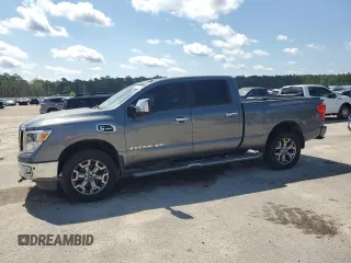2018 Nissan Titan Platinum Reserve with VIN 1N6BA1F46JN518038, listed as a Copart auction lot 61191525 with 123,846 mi miles and Clean title. Bid and sale history available at DreamBid. Image 1.