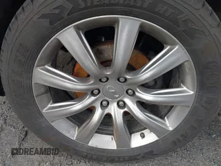 2013 Infiniti QX56 with VIN JN8AZ2NE4D9060217, listed as a IAAI auction lot 41622879 with 212,000 mi miles and . Bid and sale history available at DreamBid. Image 6.