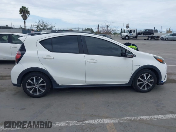 2018 Toyota Prius One with VIN JTDKDTB32J1599677, listed as a IAAI auction lot 42041923 with 83,384 mi miles and . Bid and sale history available at DreamBid. Image 13.
