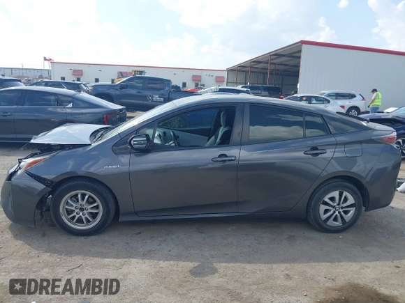 2017 Toyota Prius Two z VIN JTDKARFU3H3030401, wystawiony jako IAAI lot #41882552 z przebiegiem 130 786 mil mil oraz . Historia ofert i sprzedaży dostępna na DreamBid. Obrazek 14.