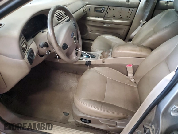 2003 Ford Taurus SES Standard with VIN 1FAFP55S23A183399, listed as a Copart auction lot 59362035 with 112,889 mi miles and Salvage title. Bid and sale history available at DreamBid. Image 7.