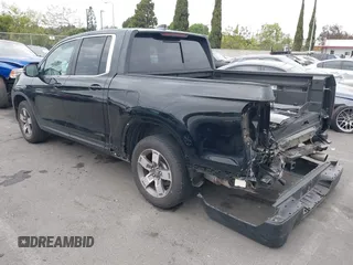 2024 Honda Ridgeline RTL with VIN 5FPYK3F56RB004027, listed as a IAAI auction lot 42049778 with 35,631 mi miles and . Bid and sale history available at DreamBid. Image 3.