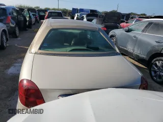 2002 Lincoln Continental with VIN 1LNHM97V32Y694132, listed as a Copart auction lot 76410144 with 0 mi miles and Non Repairable. Bid and sale history available at carsss.com. Image 6.