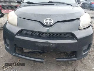 2010 Scion xD with VIN JTKKU4B45AJ058839, listed as a IAAI auction lot 41708936 with 214,685 mi miles. Bid and sale history available at carsss.com. Image 6.