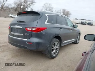 2014 Infiniti QX60 with VIN 5N1AL0MM6EC545890, listed as a IAAI auction lot 41212469 with 125,955 mi miles and . Bid and sale history available at DreamBid. Image 4.