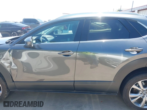2022 Mazda CX-30 S Premium with VIN 3MVDMBDL5NM416649, listed as a IAAI auction lot 41990745 with 13,923 mi miles and . Bid and sale history available at DreamBid. Image 15.