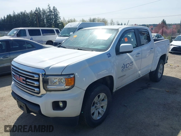 2017 GMC Canyon 4WD SLE with VIN 1GTG6CEN0H1155690, listed as a IAAI auction lot 41956326 with 56,841 mi miles. Bid and sale history available at carsss.com. Image 2.