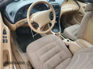 1997 Ford Mustang with VIN 1FALP4046VF180467, listed as a Copart auction lot 60754265 with 154,676 mi miles and Salvage title. Bid and sale history available at DreamBid. Image 8.