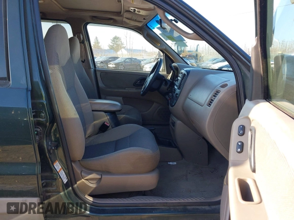 2001 Ford Escape XLT with VIN 1FMCU04161KC38571, listed as a IAAI auction lot 41881685 with 175,432 mi miles and . Bid and sale history available at DreamBid. Image 5.