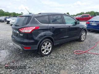 2015 Ford Escape Titanium с VIN 1FMCU0JXXFUB10676, выставлен на аукционе IAAI как лот 42412073 с пробегом 129 737 миль миль и . История ставок и продаж доступна на DreamBid. Изображение 4.