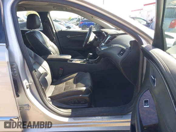 2015 Chevrolet Impala LTZ with VIN 2G1165S34F9101489, listed as a IAAI auction lot 42141525 with 149,037 mi miles and . Bid and sale history available at DreamBid. Image 5.