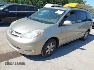 2010 Toyota Sienna XLE with VIN 5TDYK4CC5AS292110, listed as a IAAI auction lot 42055505 with 107,390 mi miles. Bid and sale history available at carsss.com. Image 17.