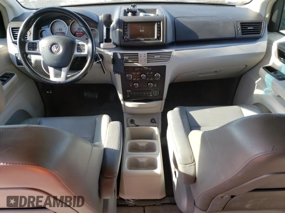 2011 Volkswagen Routan SE with VIN 2V4RW3DG3BR766608, listed as a Copart auction lot 67268015 with 144,329 mi miles and Clean title. Bid and sale history available at DreamBid. Image 8.