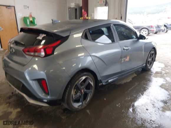 2020 Hyundai Veloster Turbo with VIN KMHTH6AB6LU029925, listed as a IAAI auction lot 41885736 with 60,625 mi miles. Bid and sale history available at carsss.com. Image 4.