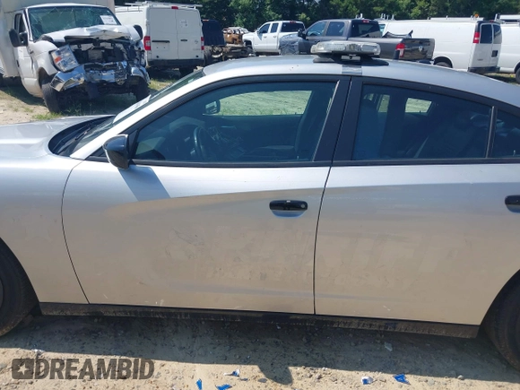 2021 Dodge Charger Police z VIN 2C3CDXAT3MH578330, wystawiony jako IAAI lot #42604008 z przebiegiem 92 856 mil mil oraz . Historia ofert i sprzedaży dostępna na DreamBid. Obrazek 14.