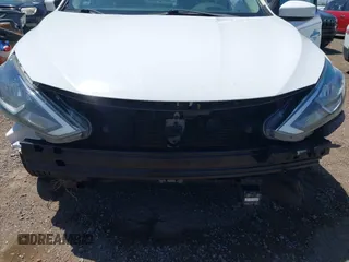2018 Nissan Sentra S z VIN 3N1AB7AP6JY301076, wystawiony jako IAAI lot #42300529 z przebiegiem 117 730 mil mil oraz . Historia ofert i sprzedaży dostępna na DreamBid. Obrazek 6.