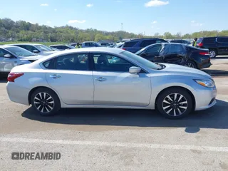 2018 Nissan Altima SR with VIN 1N4AL3APXJC258864, listed as a IAAI auction lot 42018305 with 59,265 mi miles and . Bid and sale history available at carsss.com. Image 13.