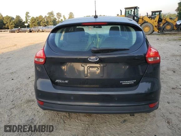 2015 Ford Focus Titanium with VIN 1FADP3N23FL346078, listed as a Copart auction lot 61991195 with 188,014 mi miles and Salvage title. Bid and sale history available at DreamBid. Image 7.
