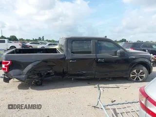 2020 Ford F-150 XL z VIN 1FTEW1C54LKF53650, wystawiony jako IAAI lot #42792712 z przebiegiem 78 047 mil mil oraz . Historia ofert i sprzedaży dostępna na DreamBid. Obrazek 13.