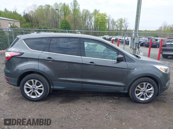 2017 Ford Escape SE with VIN 1FMCU9GD1HUC27843, listed as a IAAI auction lot 42009686 with 111,290 mi miles and . Bid and sale history available at DreamBid. Image 13.