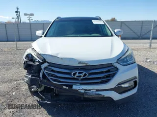 2017 Hyundai Santa Fe 2.4L z VIN 5NMZU3LB1HH045714, wystawiony jako IAAI lot #41949139 z przebiegiem 151 799 mil mil oraz . Historia ofert i sprzedaży dostępna na DreamBid. Obrazek 12.