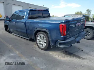 2020 GMC Sierra 1500 Denali with VIN 1GTU9FEL3LZ195864, listed as a IAAI auction lot 40593921 with 74,982 mi miles and . Bid and sale history available at DreamBid. Image 3.