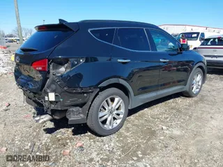 2014 Hyundai Santa Fe Sport with VIN 5XYZU3LAXEG174872, listed as a IAAI auction lot 41579071 with NaN miles. Bid and sale history available at carsss.com. Image 4.