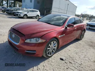 2013 Jaguar XJ with VIN SAJWJ1CD9D8V48888, listed as a Copart auction lot 77744654 with 166,529 mi miles and Clean Title. Bid and sale history available at carsss.com. Image 1.
