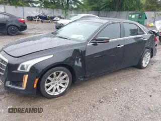 2014 Cadillac CTS AWD z VIN 1G6AW5SX4E0129136, wystawiony jako IAAI lot #42364098 z przebiegiem 137 080 mil mil oraz . Historia ofert i sprzedaży dostępna na DreamBid. Obrazek 17.