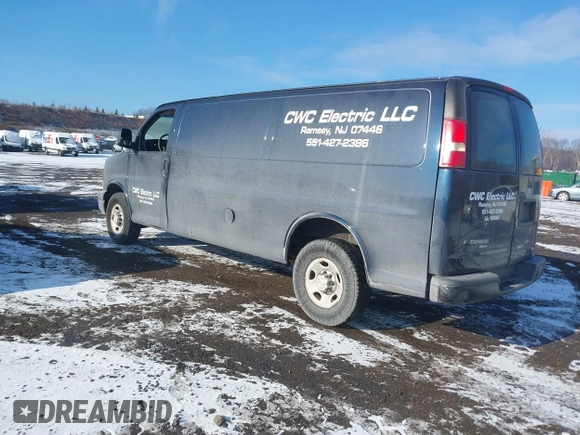 2014 Chevrolet Express Cargo Van with VIN 1GCWGGBA5E1205786, listed as a IAAI auction lot 41339085 with 201,460 mi miles. Bid and sale history available at carsss.com. Image 3.