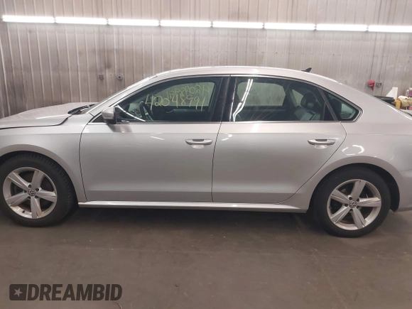 2013 Volkswagen Passat SE with VIN 1VWBH7A39DC145297, listed as a IAAI auction lot 42048991 with 146,897 mi miles and . Bid and sale history available at DreamBid. Image 15.