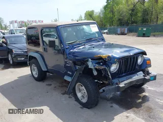 2000 Jeep Wrangler Sport with VIN 1J4FA49S5YP750123, listed as a IAAI auction lot 42060009 with Not Provided miles. Bid and sale history available at carsss.com. Image 1.