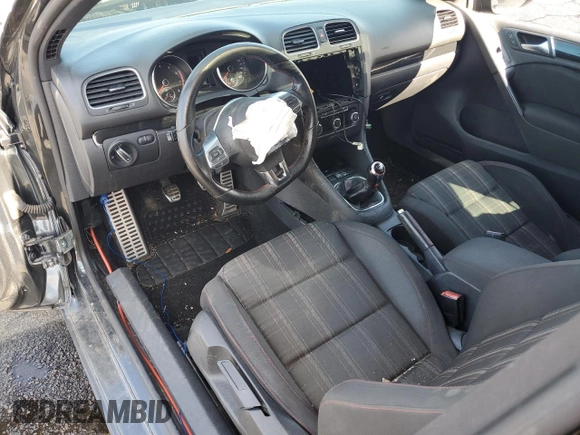 2012 Volkswagen GTI w/Conv & Sunroof с VIN WVWEV7AJ5CW145480, выставлен на аукционе Copart как лот 71466434 с пробегом Не указан миль и Списание • Salvage title. История ставок и продаж доступна на DreamBid. Изображение 8.